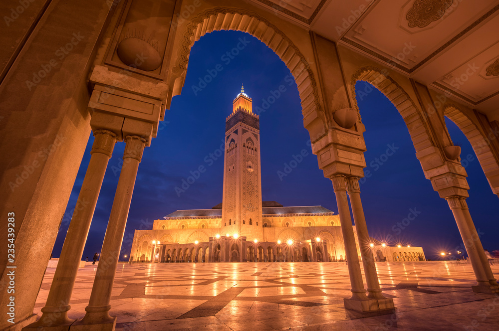 The Hassan II Mosque at the night in Casablanca, Morocco. Hassan II Mosque is the largest mosque in Morocco and one of the most beautiful. the 13th largest in the world. Shot after sunset at blue hour