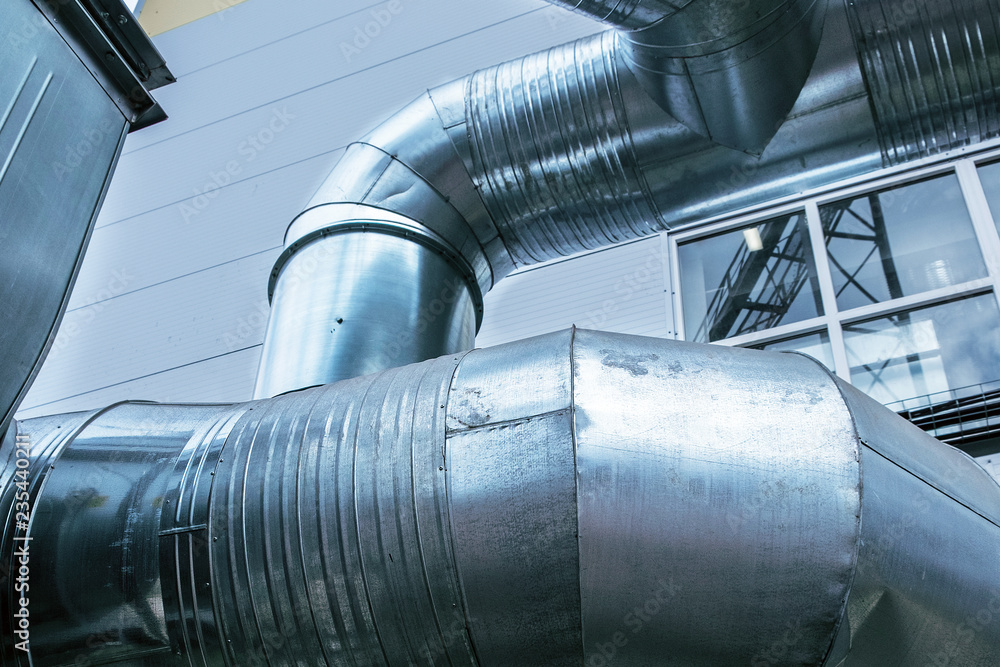 Φωτογραφία Close up view of the modern industrial building exterior with huge diameter ventilation pipes on the facade
