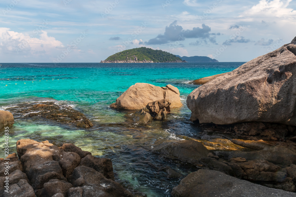 Granite boulders surrounding a beautiful tropical beach