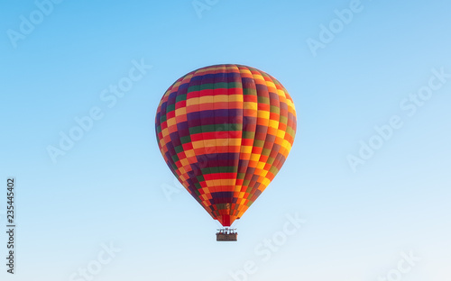 Airballoon in Turkey, Cappadocia. Travel and leisure. Adventure in the air. Concept and idea of adventure. Airballoon on the sky background © biletskiyevgeniy.com