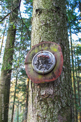 ZARABIE, POLAND - MARCH 15, 2015: Jesus Christ roadside chapel in Carpathian Mountains