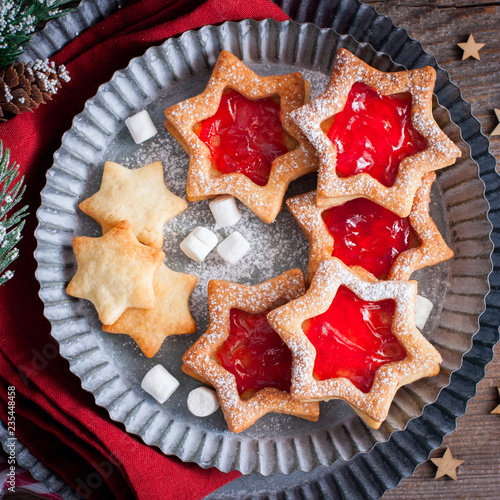 Christmas cookies. Linzer cookies with raspberry jam, sguare photo