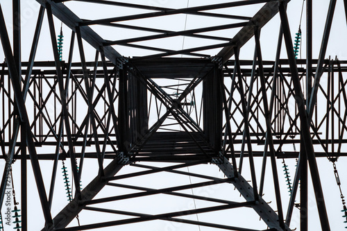 Metal frame of an electrical tower in cloudy weather