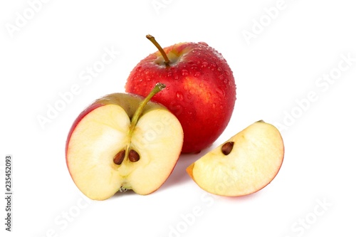 Red ripe apple with a apple piece isolated on white