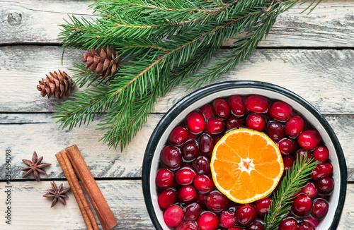 Christmas potpourri. Top view. Hot scented beverage made from cranberry, cinnamon, clementines and spices.
