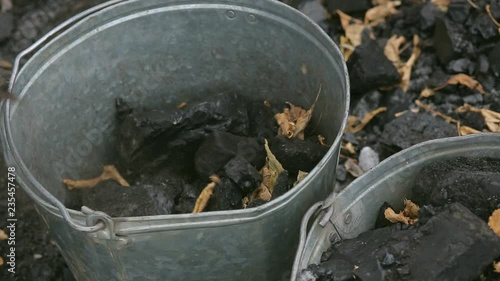 Wallpaper Mural bearded man loads coal shovel in the winter in the Russian village Torontodigital.ca