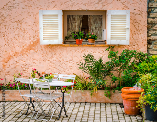 Typical front door space with table and chairs in Mougins, France