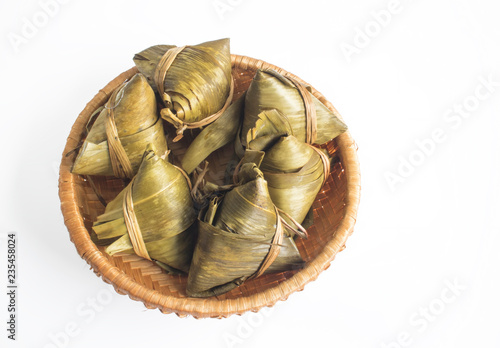 Vietnamese traditional food for may 5th, is double five festival or tet doan ngo, sticky rice cake in green leaf, also call banh u tro with pyramidal shape