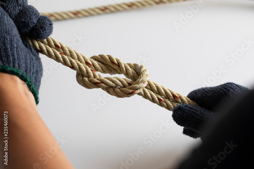 Man checking rope Knot photo