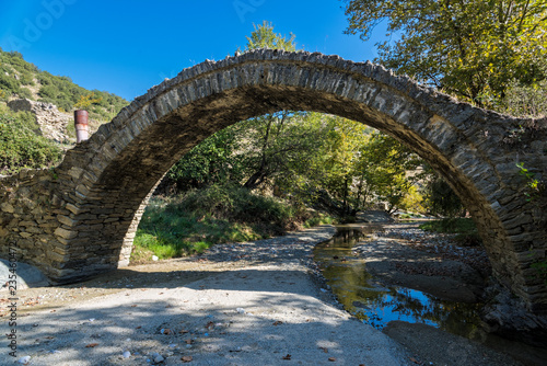 View of the traditional stone bridge near Elassona in Thessaly, Greece © dinosmichail