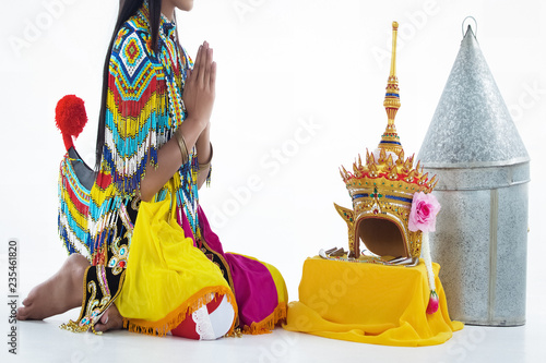 The lady in Southern thai classical dancing suit is posing on white background. photo