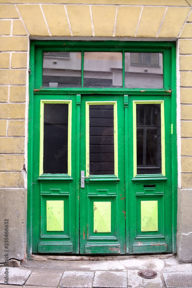Green door in old building, Tallinn, Estonia