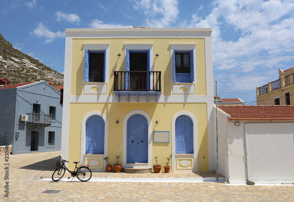Bicycle parked outside Beautiful Greek Home in Kastellorizo,Greece
