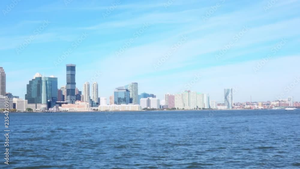 New York, Manhattan. Water front view of Manhattan from cruise boat at sunny autumn day. New York, Manhattan. Water front view of Manhattan from cruise boat at sunny autumn day.