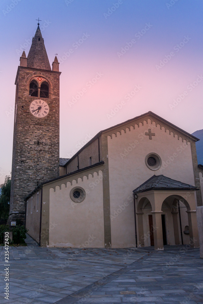 church with bell tower at sunset