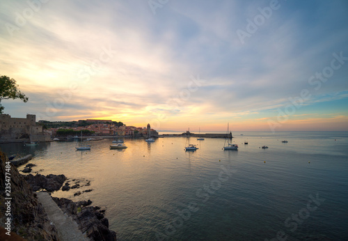 Beautiful small harbour of Collioure at sunset time © DigiHand