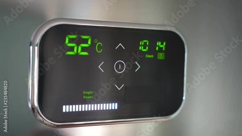 Wi-Fi smart thermostat for smart home. Thermostat controls and regulates the house remotely photo