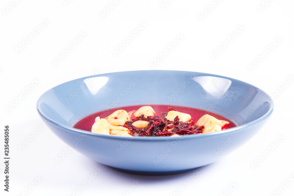 Traditional polish Christmas Eve dish: red borscht with uszka (a mushroom filled kind of dumplings) Traditional polish Christmas Eve dish: red borscht with uszka (a mushroom filled kind of dumplings)
