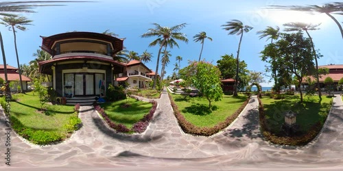 vr360 modern hotel with villas in tropical resort by sea. tropical resort with pool travel concept. photo