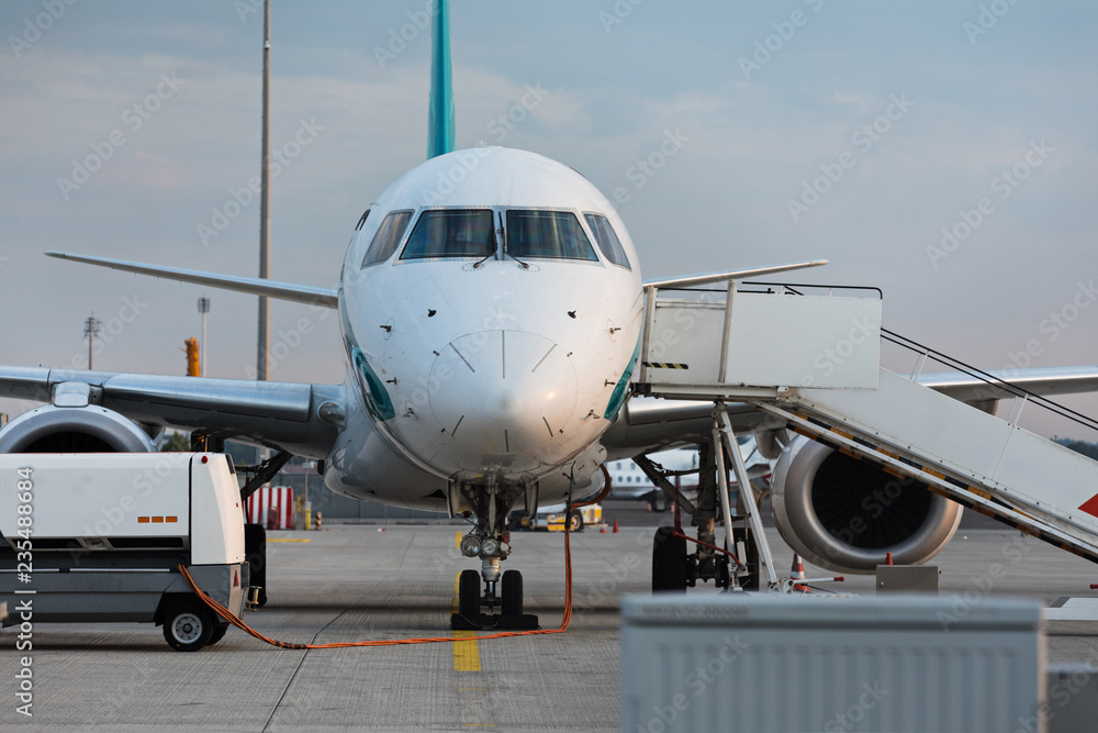 Front view of commercial jet plane on the runway. Front view of commercial jet plane on the runway.