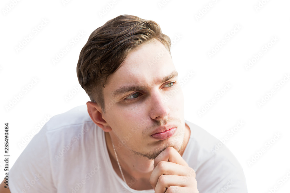 Young man in white thinking on white background. Isolated on white Young man in white thinking on white background. Isolated on white
