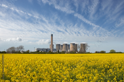 EGGBOROUGH POWER STATION WITH FIELD OF RAPE SEED YORKSHIRE ENGLAND