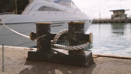 Moored ships to the berth of the sea port, a place for mooring photo