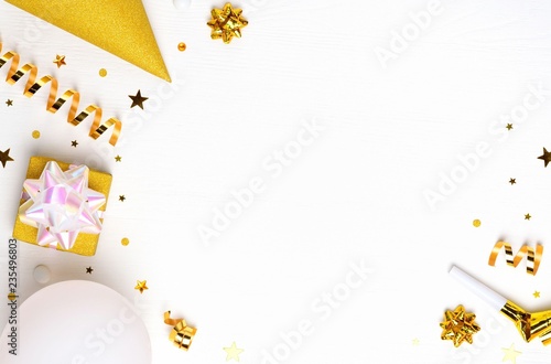 Flat lay decoration party concept on white background. Birthday or party greeting card with copy space. Flat lay, top view.