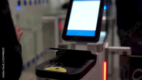 Passenger At Automated Customs Clearance Scanning passport In Airport. photo