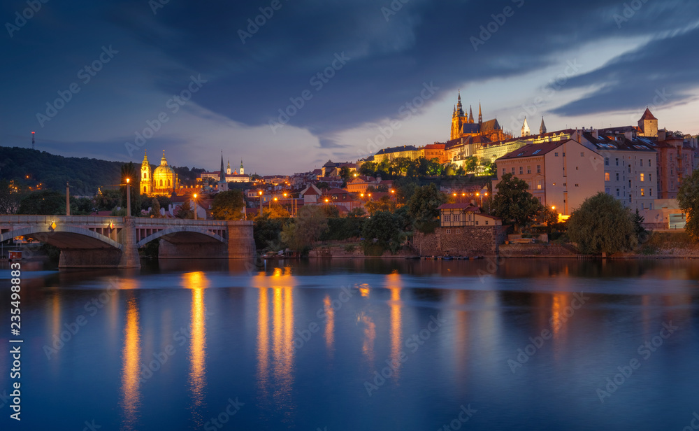 Prague Castle and manes bridge in Czech Republic at the sunset. Typical Panorama