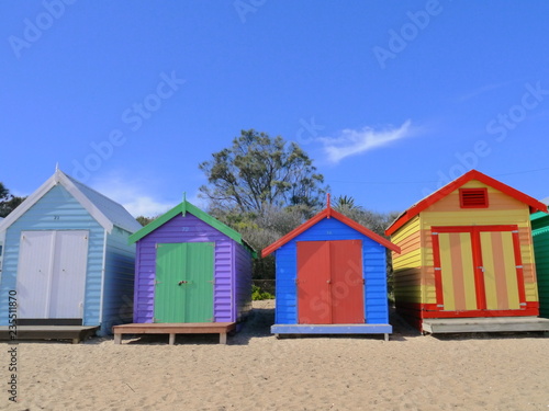 front view on colourful beach huts in Brighton, Melbourne, Victoria, Australia