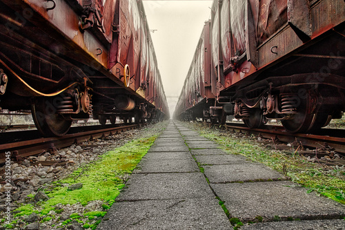 Old train wagons parked in a train station