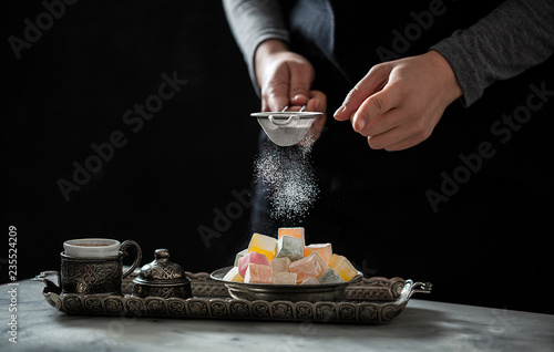 Chef is putting the sugar on the Turkish delight