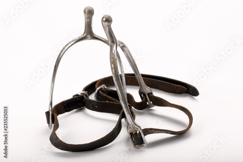 Wall Mural Old stirrups for horse riding isolated on a white background