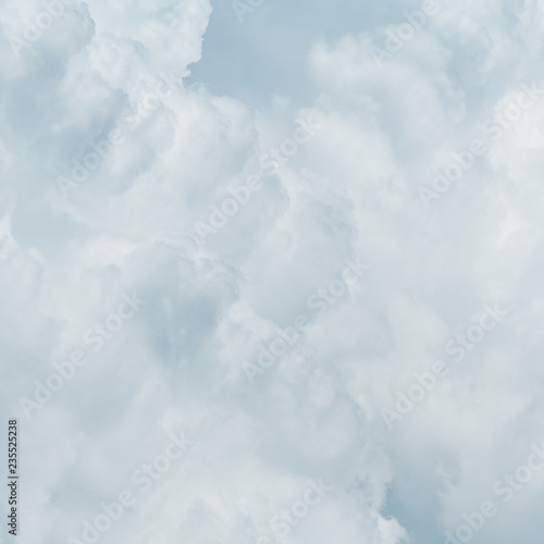 Gray cumulus fluffy clouds as  background, texture (abstract, square aspect ratio)