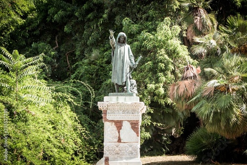 The bronze statue of Cola Di Rienzo near Piazza del Campidoglio. Campidoglio square. Cola di Rienzo statue by Gaetano Masini in 1887. Rome, Italy. photo