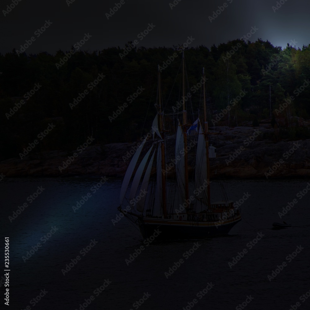 Sail ship. Photo in vintage image style. Night shot