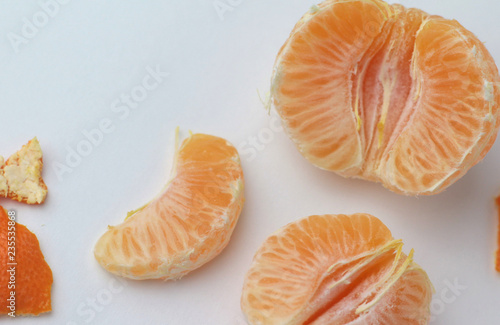slices of tangerine isolated on white