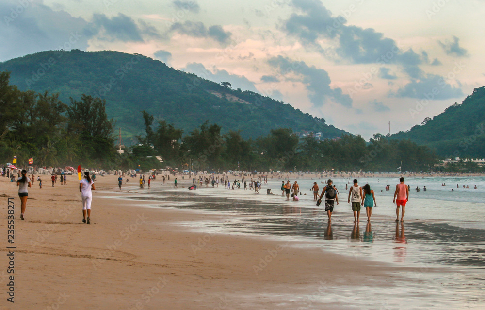 people walking on the Phuket beach
