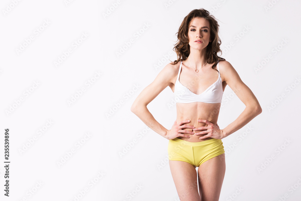 Beautiful female with beautiful body after diet isolated. Beautiful female with beautiful body after diet isolated.