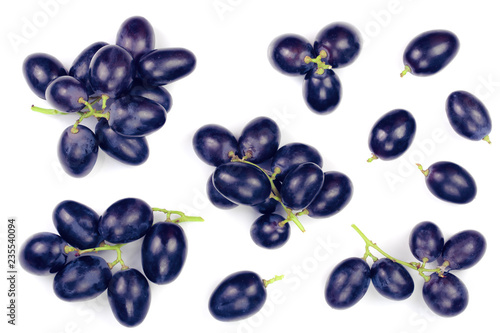 blue grapes isolated on the white background. Top view. Flat lay pattern