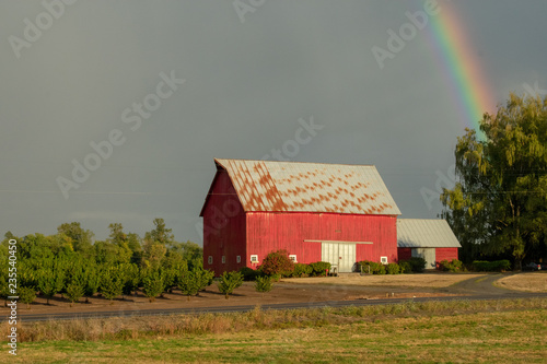 Barn and rainbow