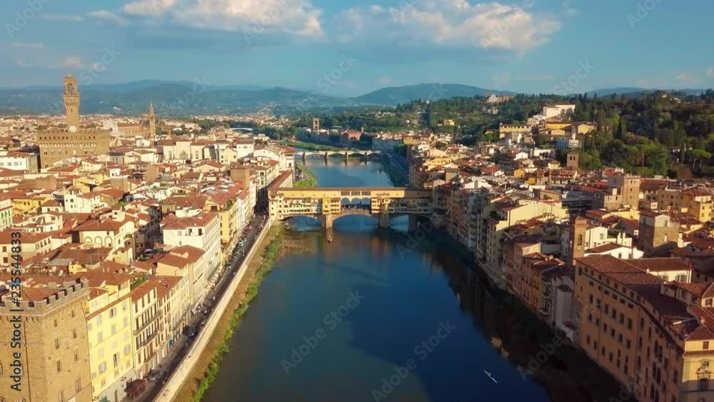 Aerial view. Florence Ponte Vecchio Bridge and City Skyline in Italy. Florence is capital city of the Italian region Tuscany. Aerial view. Florence Ponte Vecchio Bridge and City Skyline in Italy. Florence is capital city of the Italian region Tuscany.