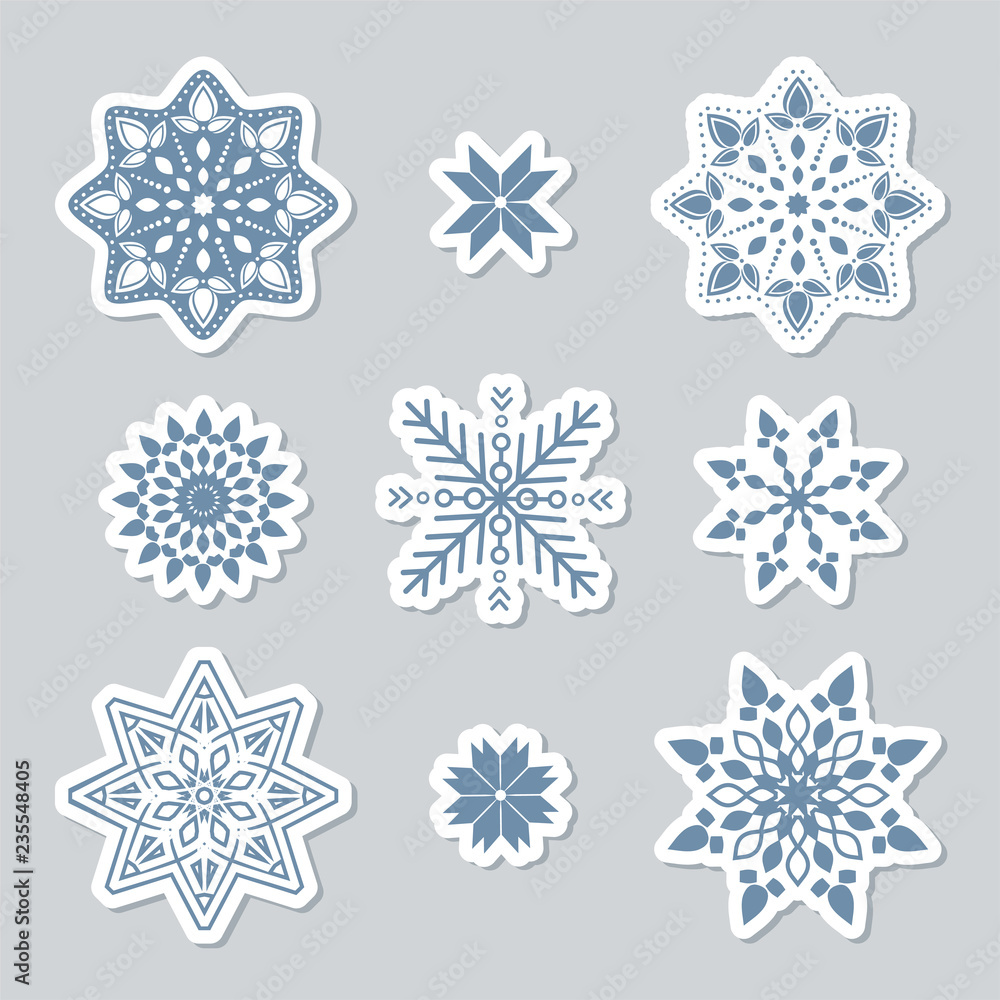 Set of snowflakes. Beautiful winter ornament. Collection of stickers of snowflakes to cut out. Christmas paper Icons Set of snowflakes. Beautiful winter ornament. Collection of stickers of snowflakes to cut out. Christmas paper Icons