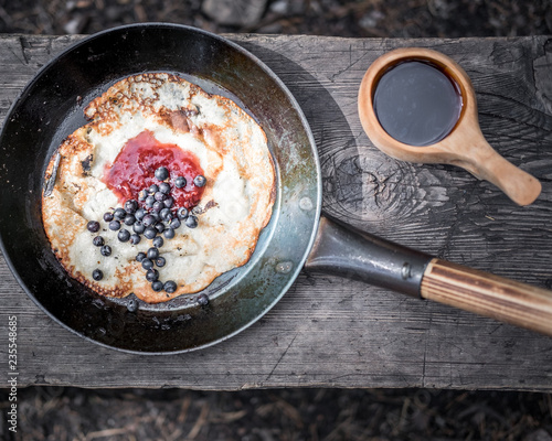 Wallpaper Mural Coffee and hot crepe with fresh blueberries and strawberry jam on a wooden benc in the woods. Torontodigital.ca