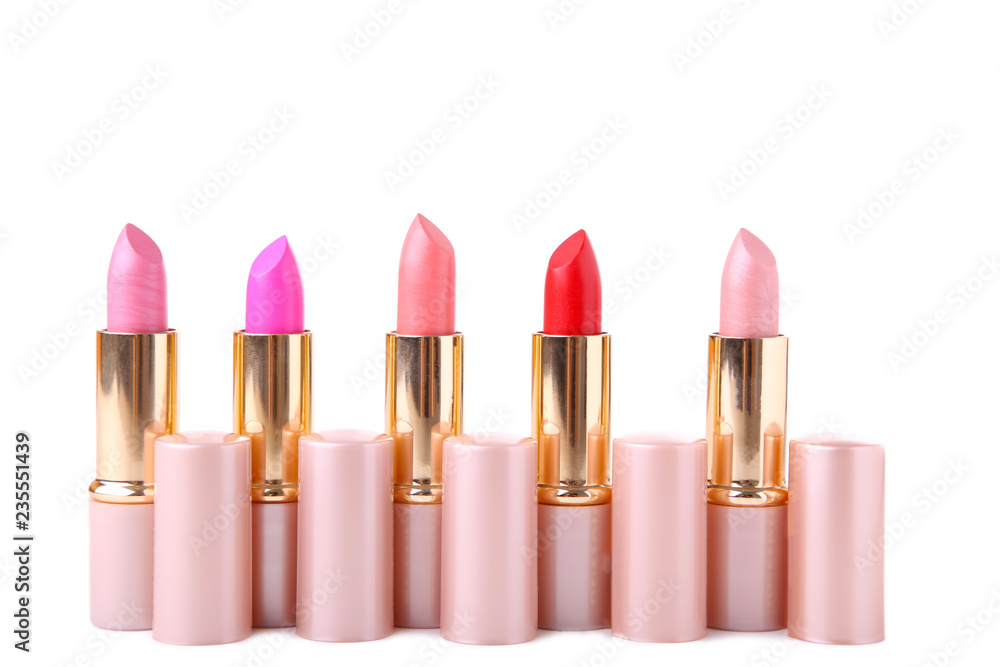 Obraz premium Colorful lipsticks isolated on white background