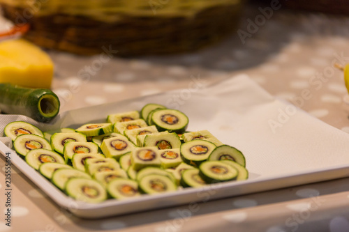 Composition of zucchini cut into slices and postage on plate