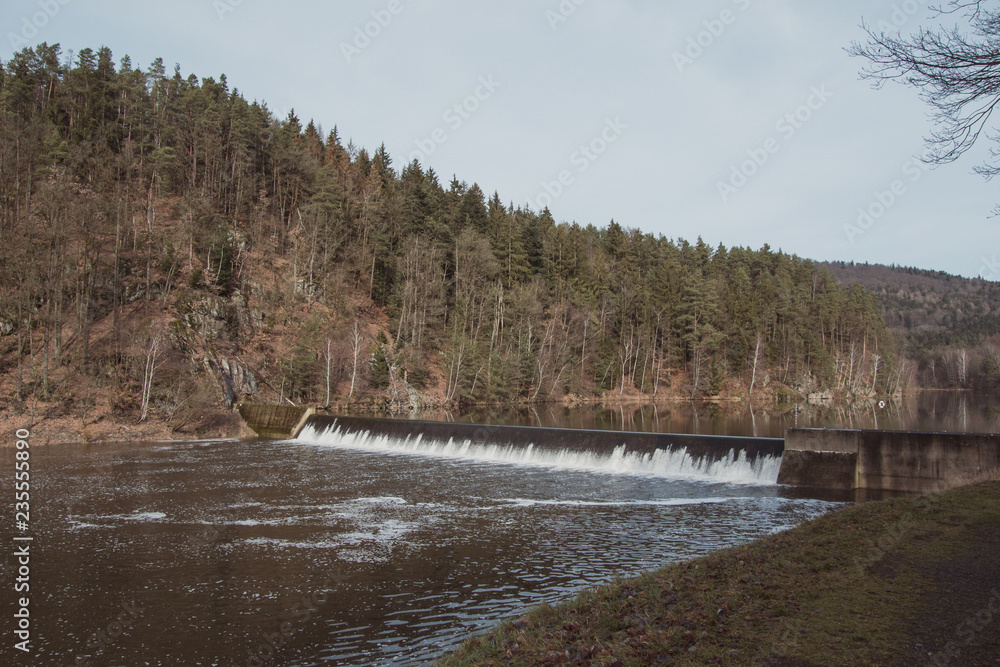 Dam Water Flow, Surface Flow, Flowing Water At Small Water Reservoir Rural