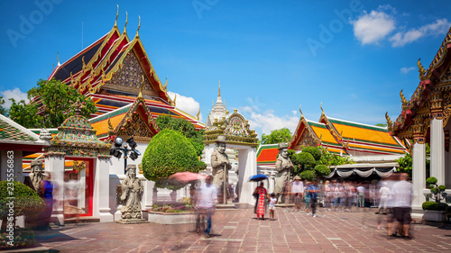 Wat Pho Temple and Tourists in Bangkok, Thailand photo