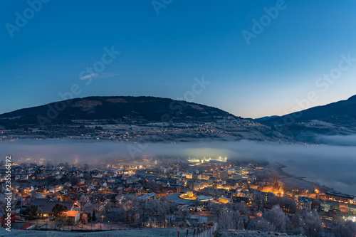 Stratus clouds over Voss town. Hordaland, Norway. photo